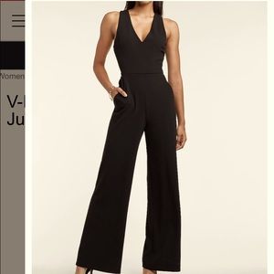 Express jumpsuit size XS. BRAND NEW W/ tags. Sleeveless, backless & pockets!